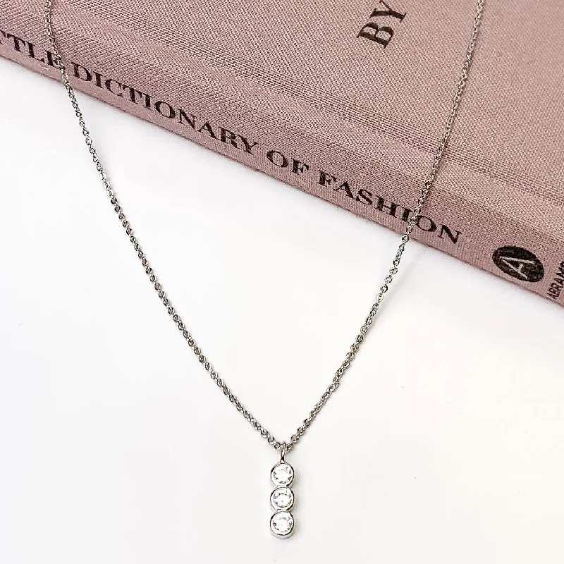 Silver Tone Necklace with Triple Clear Crystal Pendant