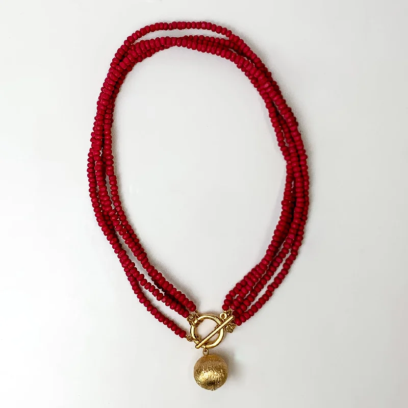 Four Strand Beaded Necklace with Gold Tone Ball in Red