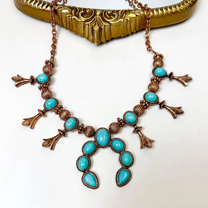 Copper Tone Squash Blossom Necklace with Naja Pendant in Turquoise Blue