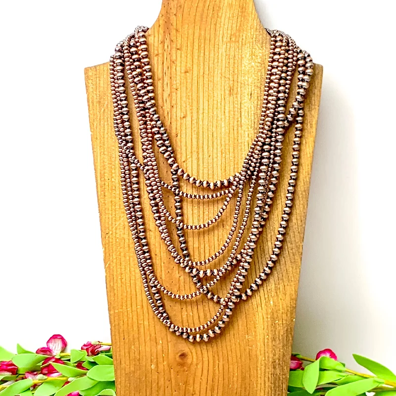 Nine Strand Faux Navajo Pearl Necklace in Copper Tone