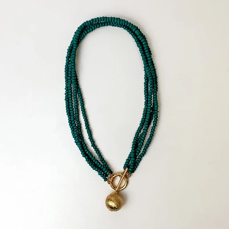 Four Strand Beaded Necklace with Gold Tone Ball in Turquoise