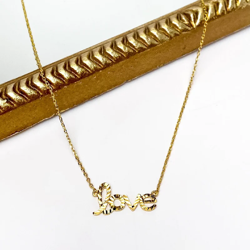 Gold Tone Necklace with Love Pendant