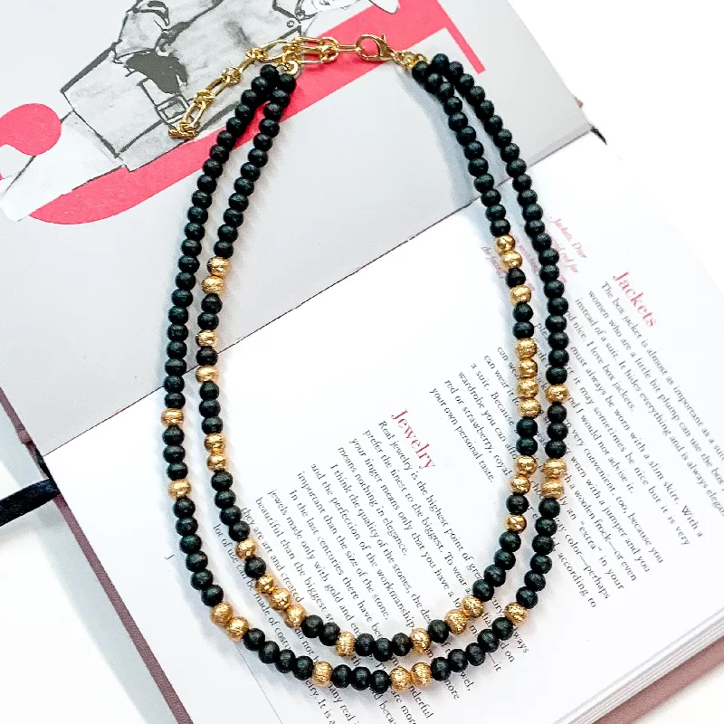 Making Joy Small Beaded Two Strand Necklace with Gold Tone Spacers in Black